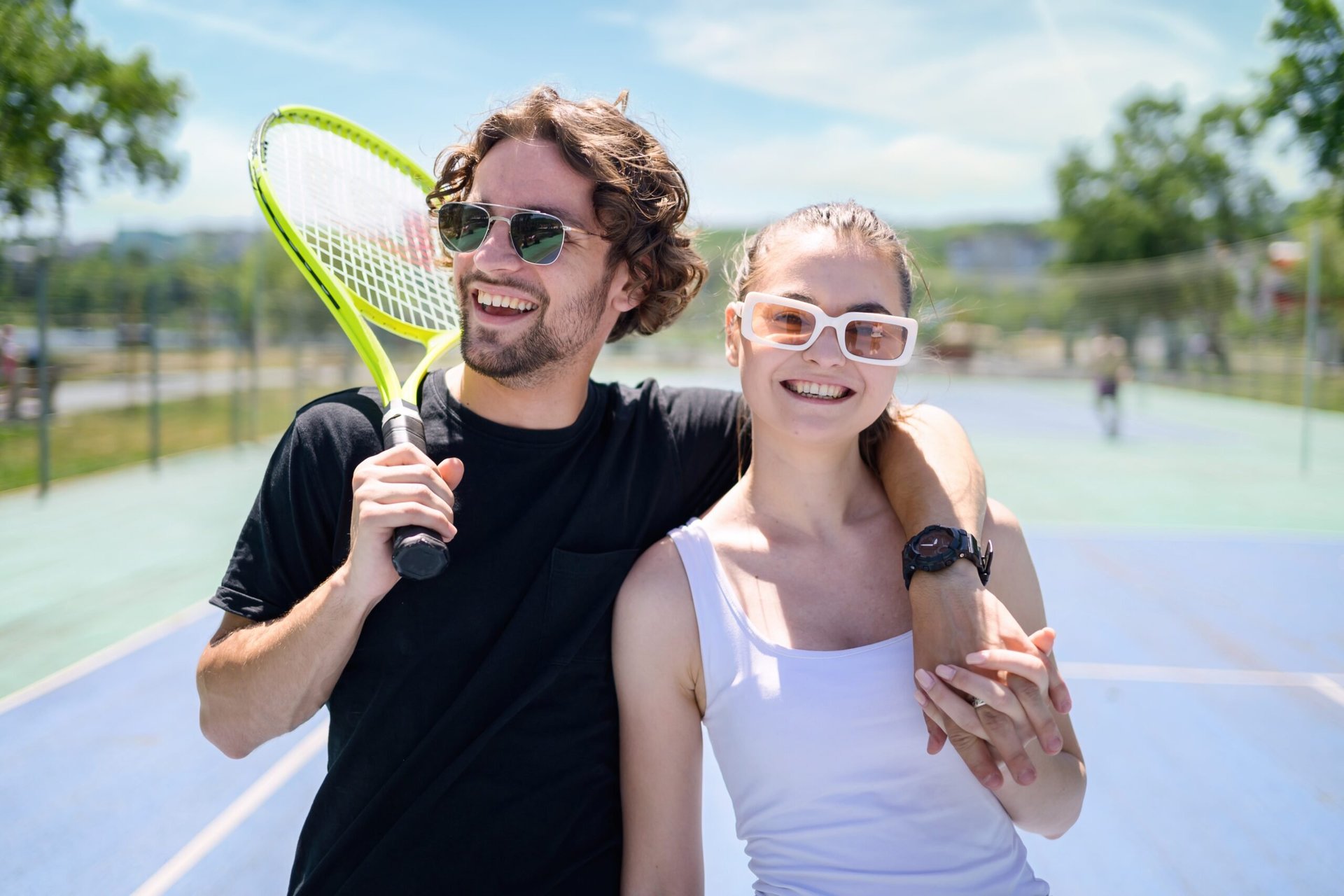 Young couple playing tennis