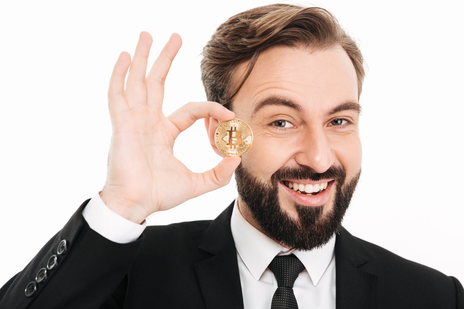 Cryptocurrency millionaire holding Bitcoin