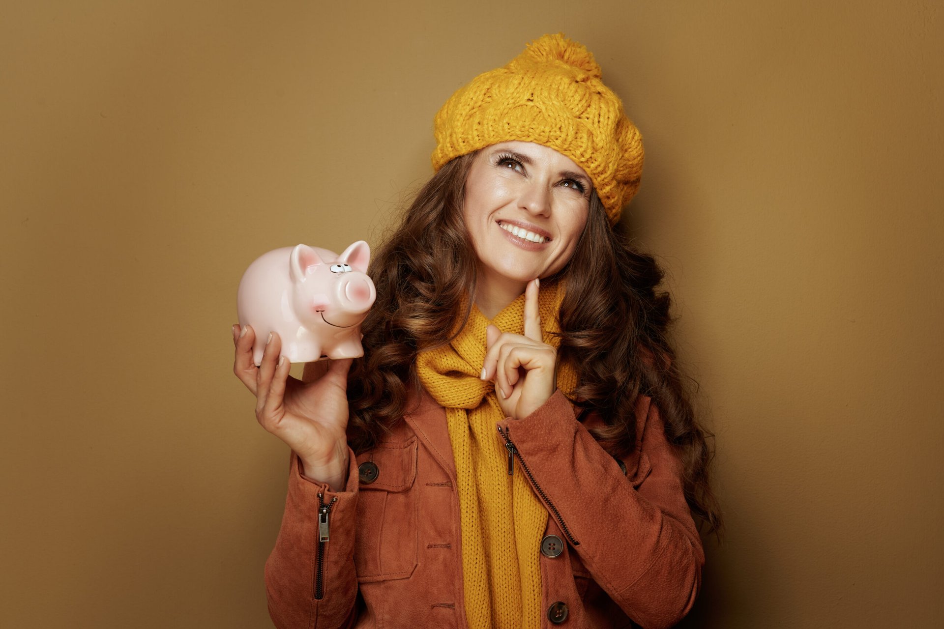 woman with piggy bank thinking about smart money moves