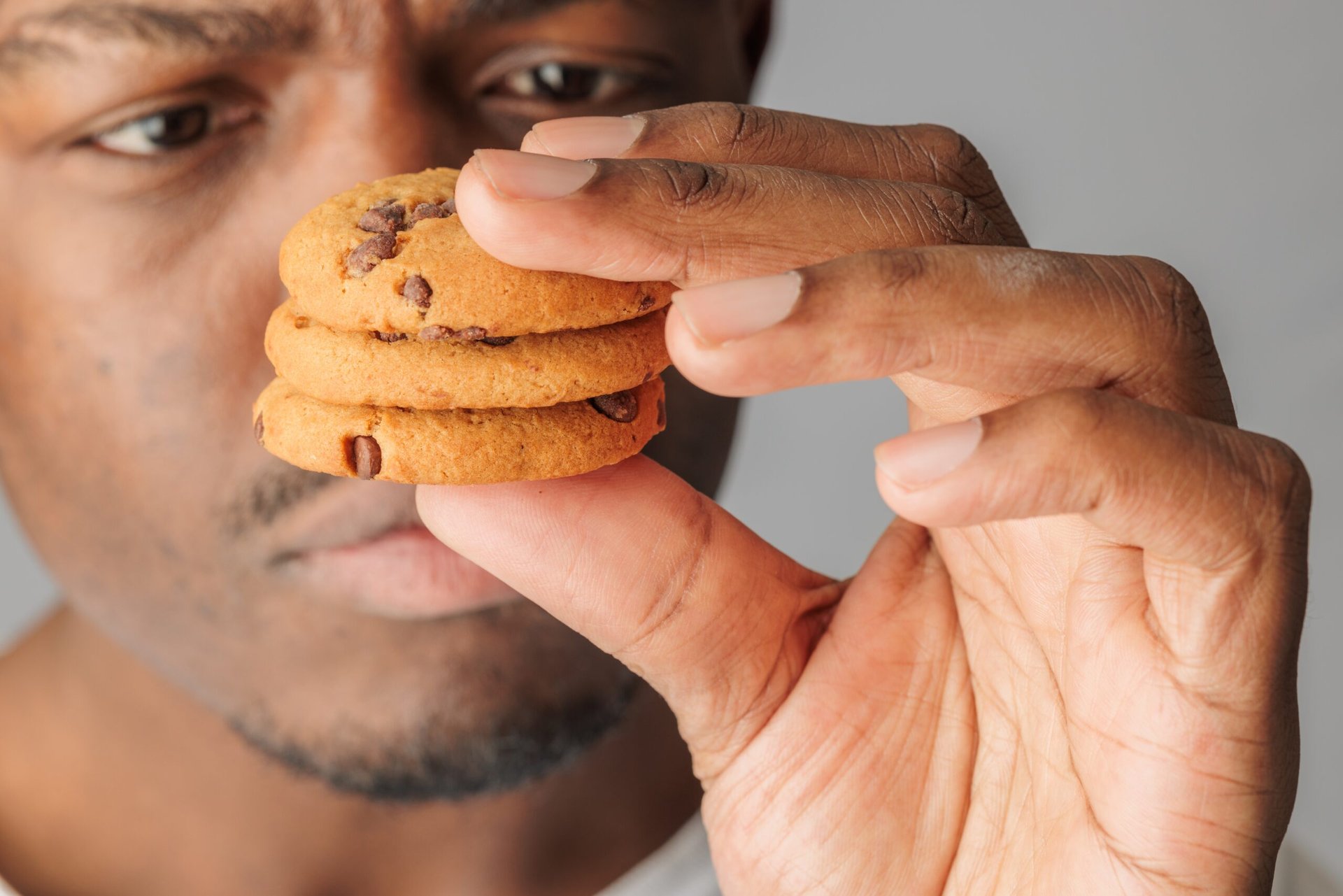 A man looking at cookies