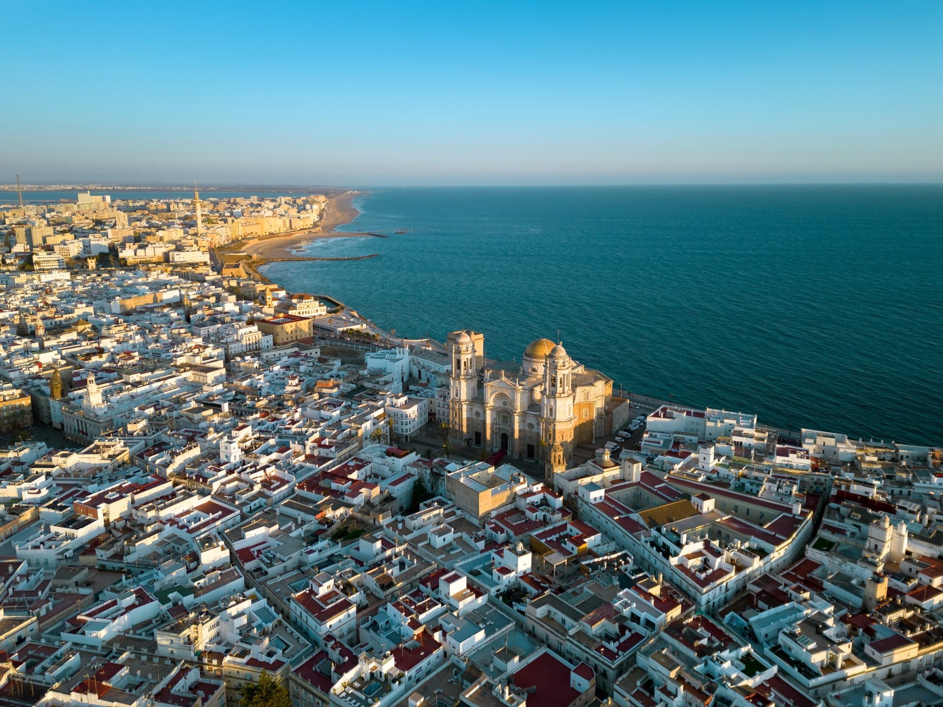 Aerial view of Cadiz, Spain at sunset. View of city center with Cathedral of Cadiz.