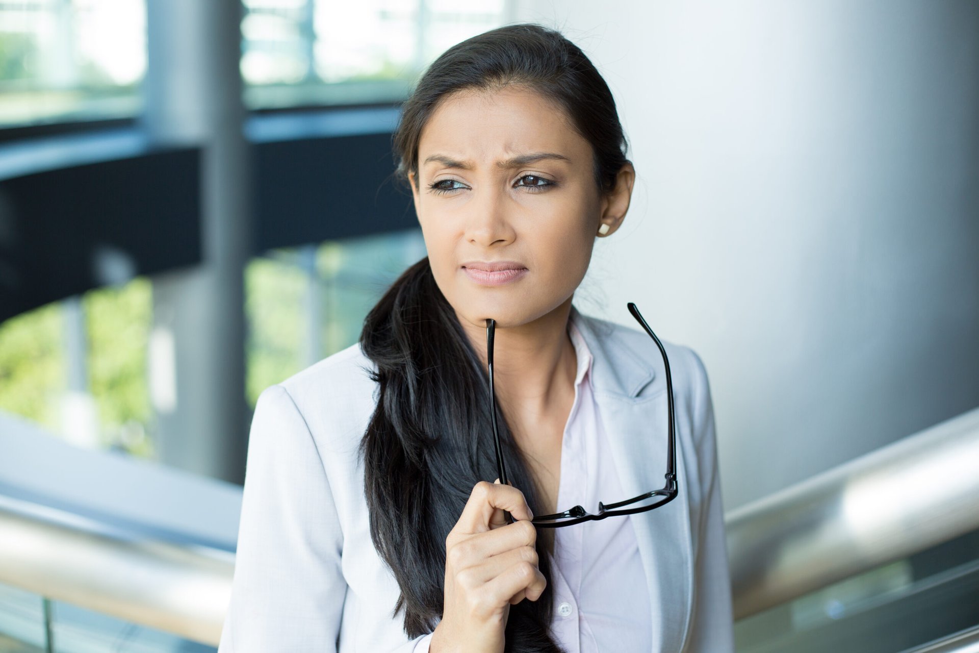 Wistful female worker with career regrets