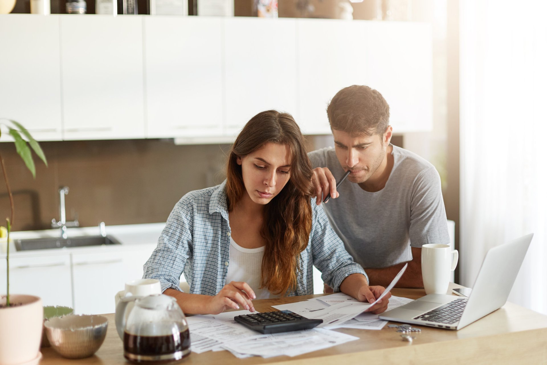 Couple looking over their finances together.