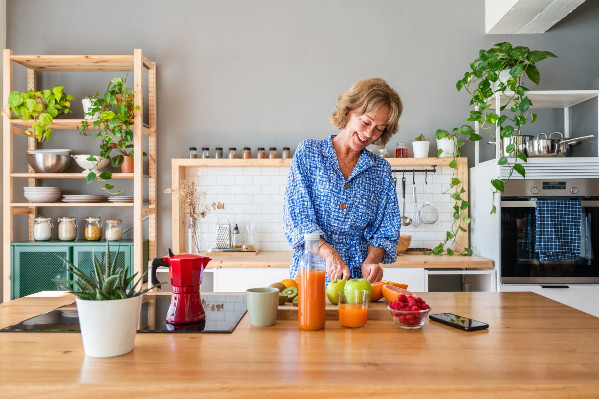 Happy woman in kitchen