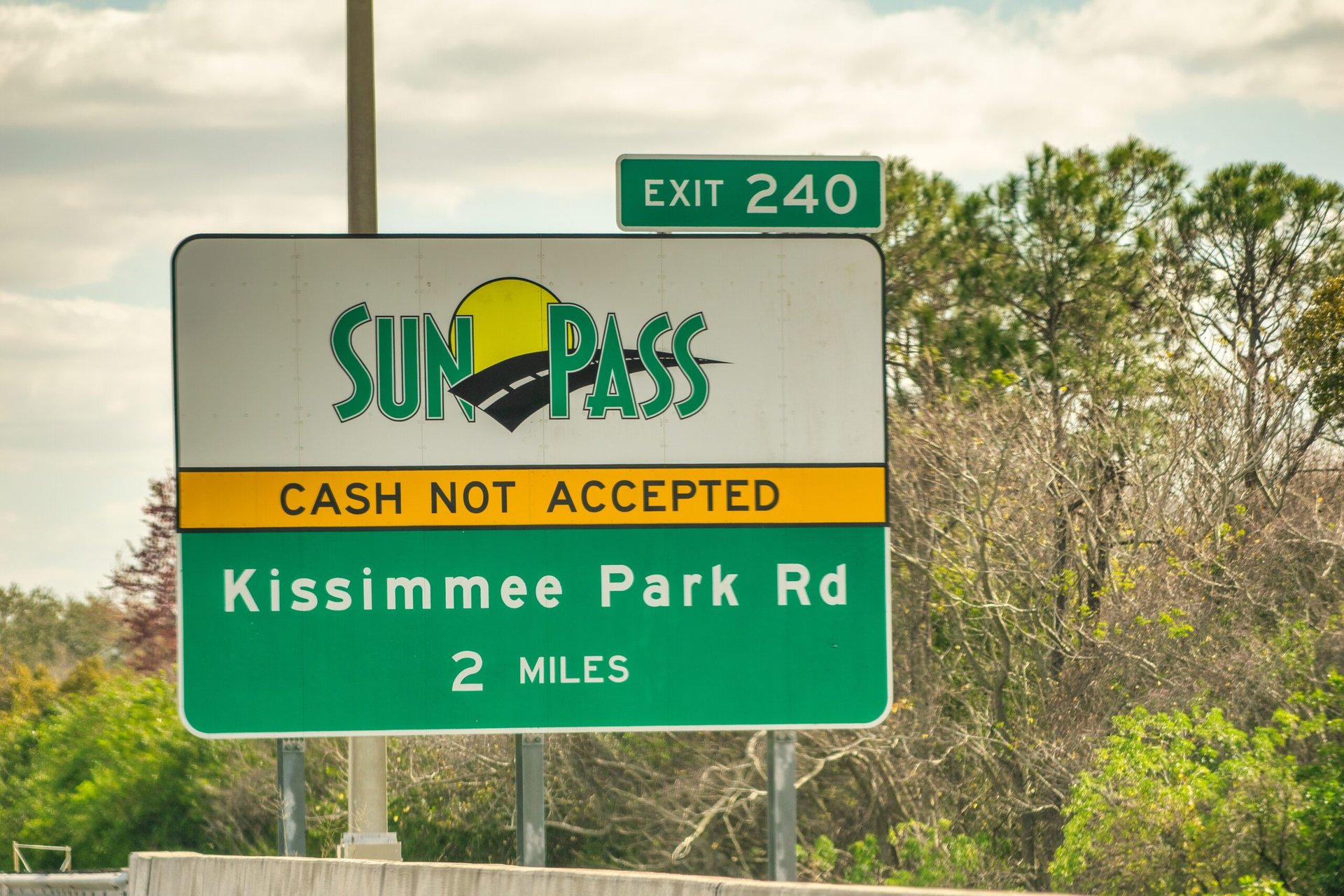 SunPass road sign along the highway in Orlando, Florida.