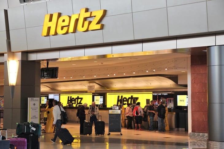Hertz rental car counter at an airport